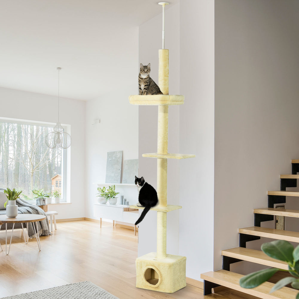 Floor-to-ceiling cat tree with scratching post, house and bed, beige